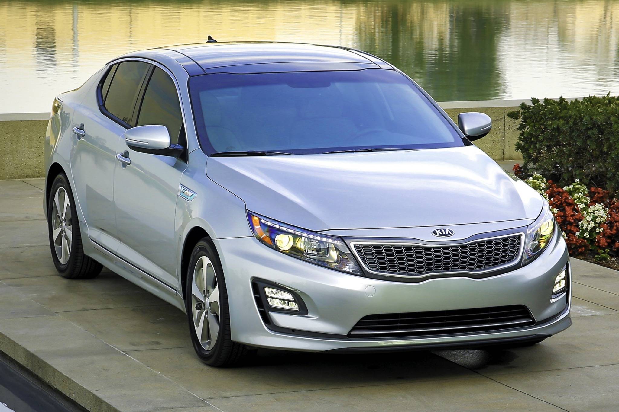 Кии оптима. Kia Optima 2014. Киа Оптима гибрид. Kia Оптима 2014. Kia Optima 2015sx.